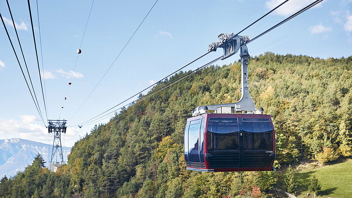 Renon/Ritten cable-car with the forest on the background